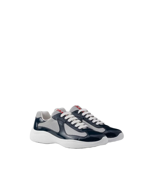 Prada America's Cup navy sneakers with white laces and white rubber soles